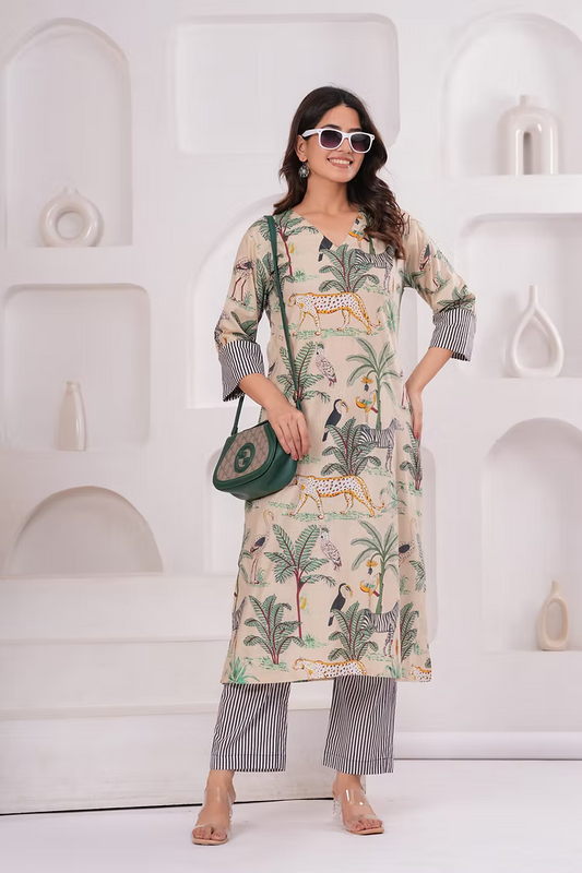 Woman wearing a patterned outfit with a white background