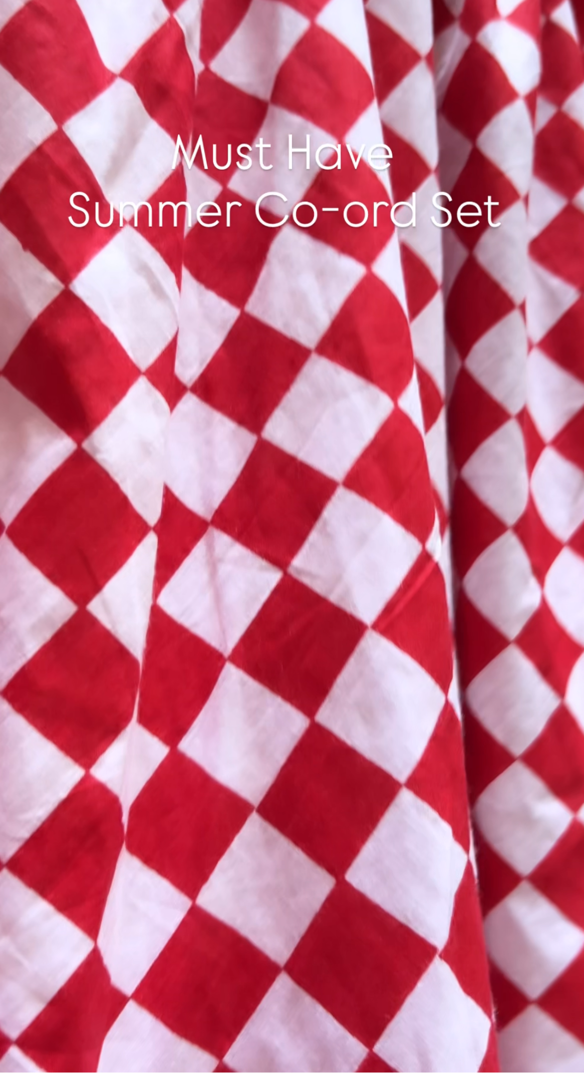 Red and white checkered fabric skirt.